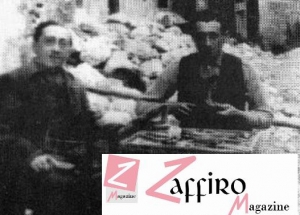 “Don Natale in compagnia del calzolaio Angelo Ferri. Alle spalle si notano le macerie del terremoto del 1915.” (gentile concessione di Ruggiero Mariani)